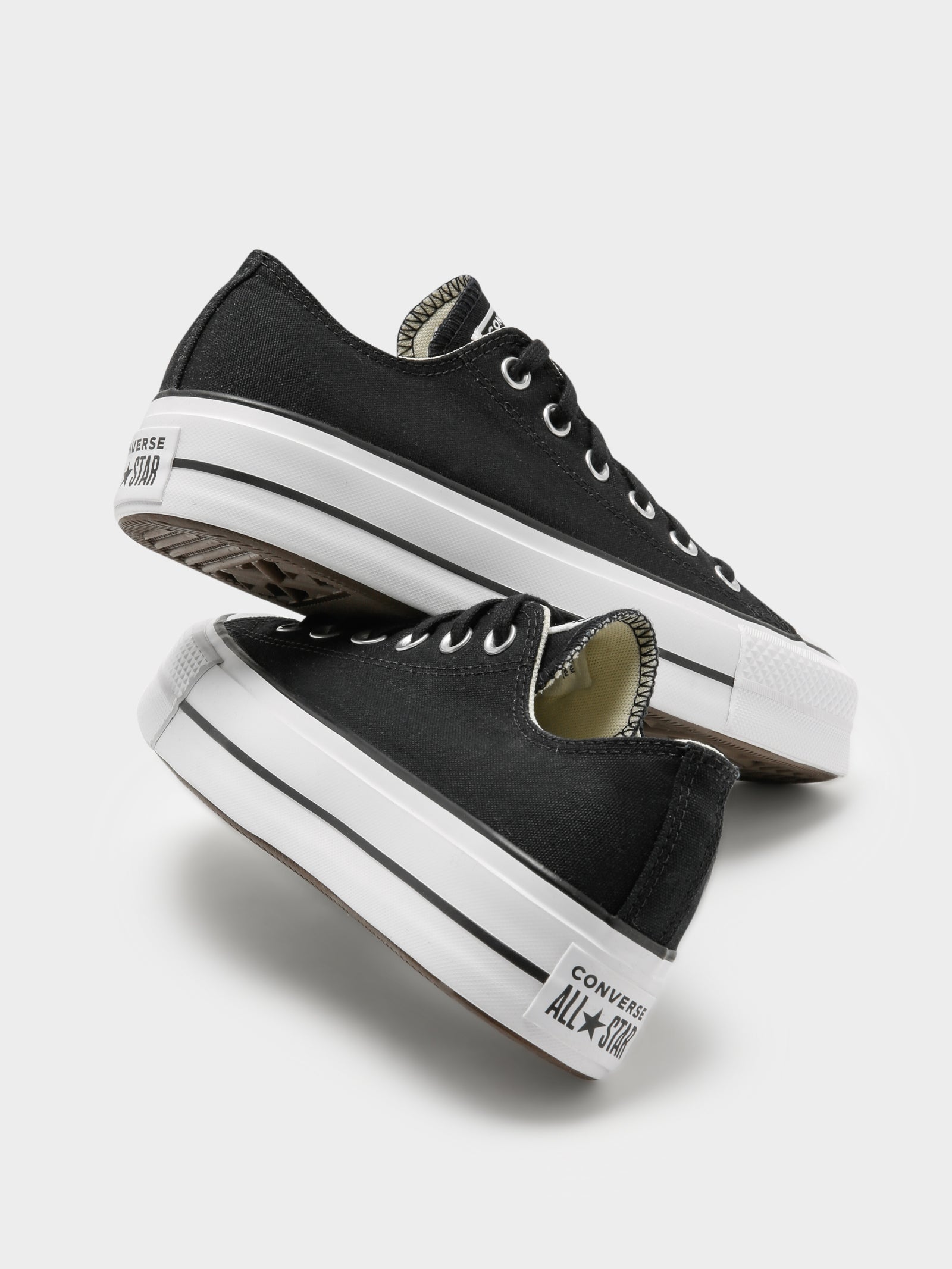 Chuck Taylor All Star Lift Low Top Sneakers in Black & White - Glue Store