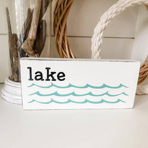 Lake sign with waves