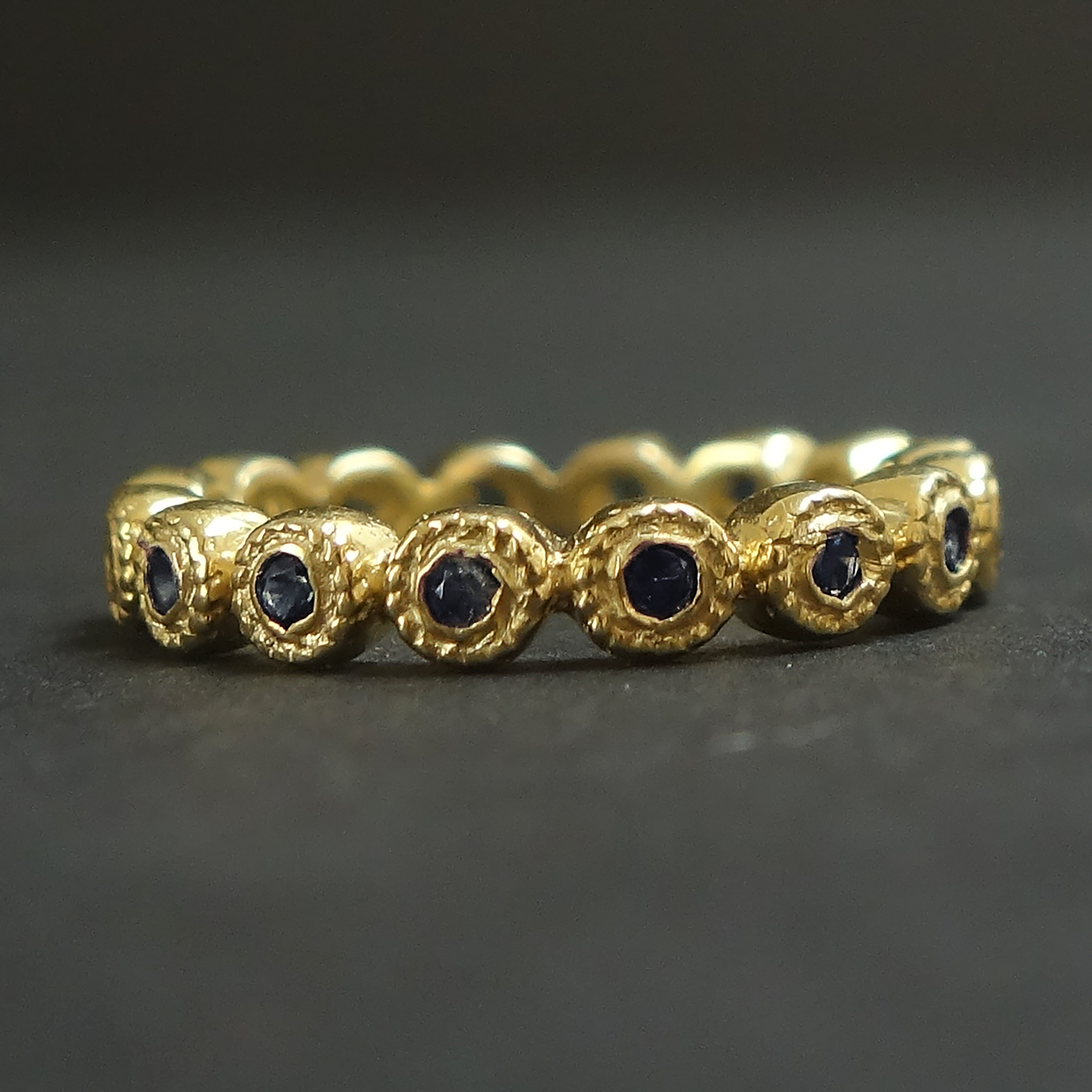 Stacking sapphire rings in silver + gold