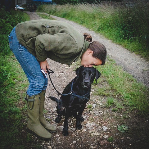 Labrador and owner working Gundog test