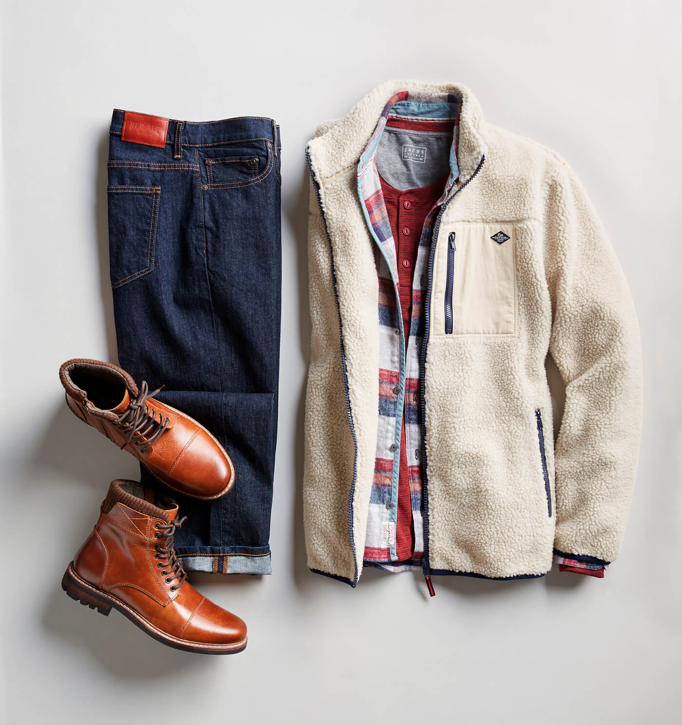 men rugged outfit - fleece zip-up layered over a long sleeve top or a tee.