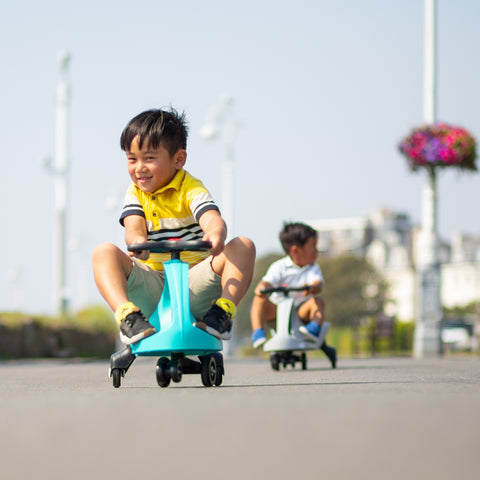 Children racing on Didicars