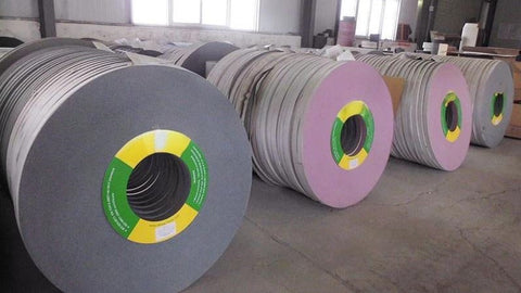 A large number of cutting wheels are stored in the warehouse.