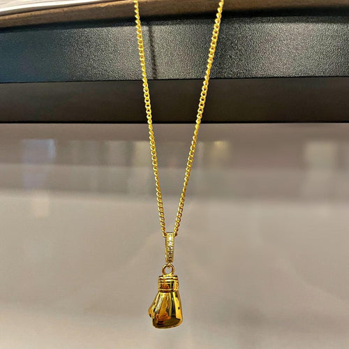 Sold at Auction: 14Kt Custom Made Boxing Gloves Pendant