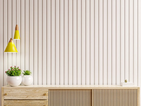 Los revestimientos de madera para decorar un recibidor pueden ser de colores naturales u otras tonalidades