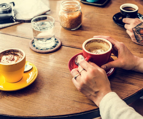 Person drinking a fresh coffee