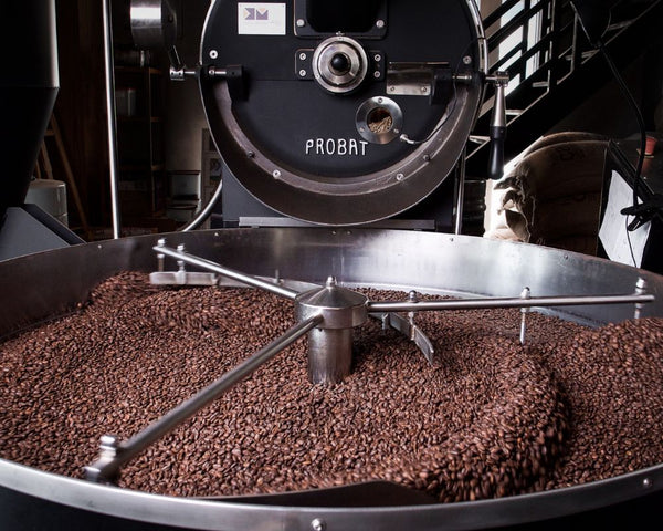 Coffee beans resting in the coffee roaster resting before being bagged