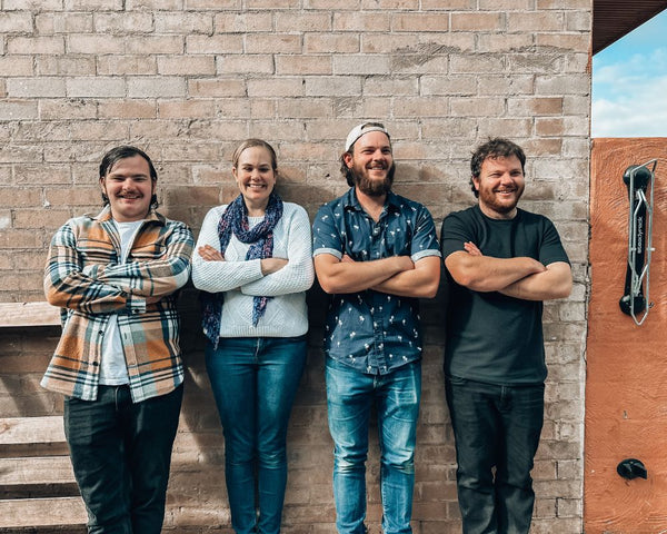 Perth-Coffee-Roaster-Brightside-Coffee-and-their-team-standing-against-a-wall