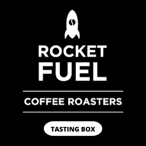 Rocketfule logo with rocketship with coffee bean icon above text that read rocket fuel coffee roasters tasting box