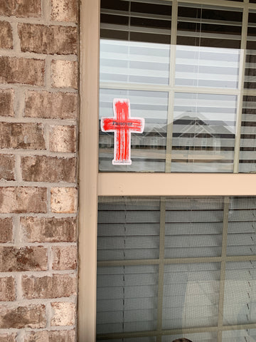 Passover cross in window