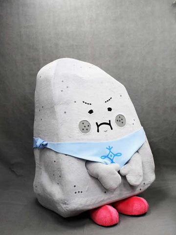 The mascot Boujii from Taishi Town in Hyogo Prefecture. He's an elementary school child but also a millions of years old boulder. He's wearing a blue bandana with his town icon on it, as well as little red shoes. His face has a perpetual frown, because even though he's kind and cute, he's also a sour, hateful little rock.