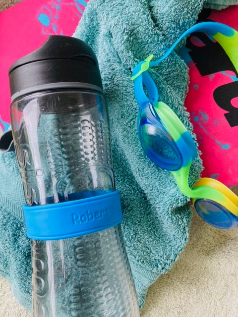 water bottle with swimming gear 