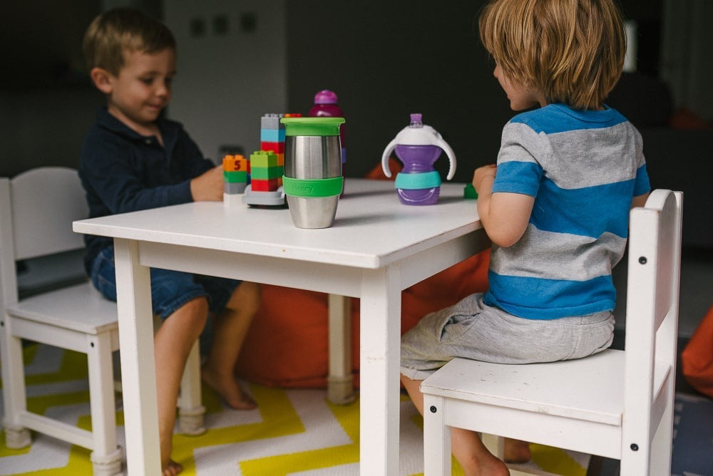 Kids at table with water bottles