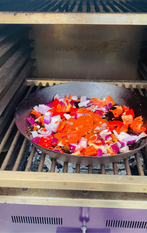 Fry the vegetables and spice mix for Shakshuka Eggs