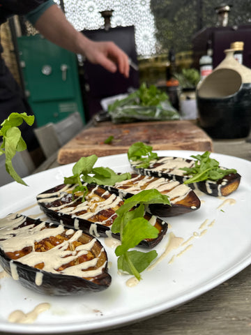 Drizzling aubergines with tahini