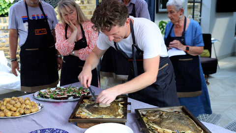 Bart Van Der Lee showing Charlie Oven masterclass students how to serve a whole turbot.  Turbot is one of the kings of the sea!  Delicious and extravagant.  So delicious!   We cooked this dish as part of the Fish and Seafood masterclass with Chef Bart Van Der Lee and Charlie Oven.  