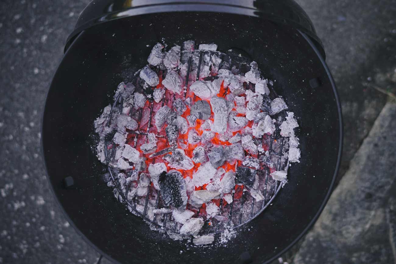 Burned charcoal and ash in a charcoal grill