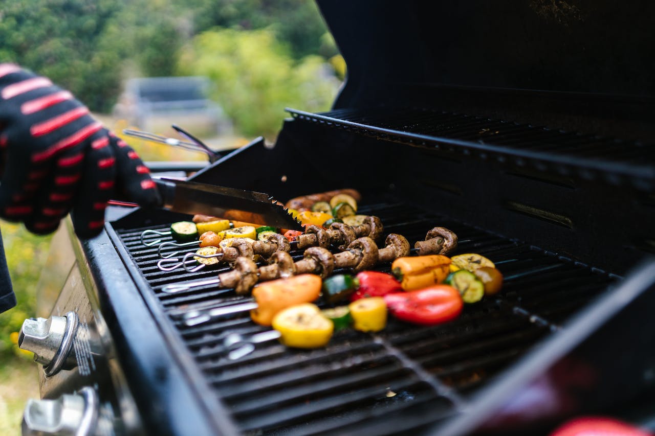 Skewered vegetables on a gas grill