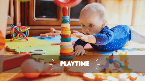 Baby playing with wooden toy