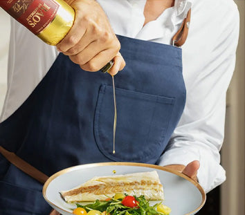 Elevate your food to the next level Raos olive oil poured over fish and salad