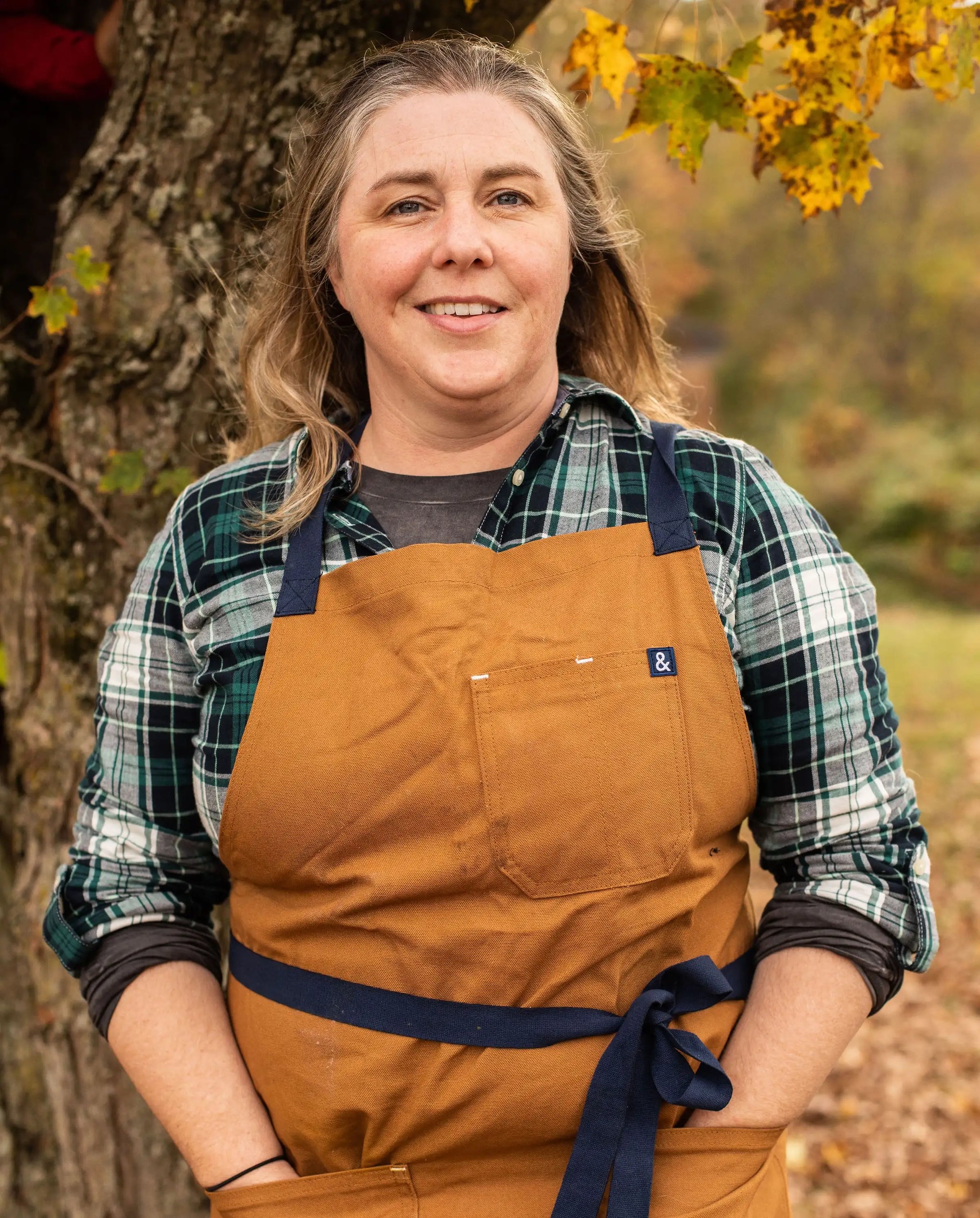 Kate in front of tree.webp__PID:ab95ff63-b37c-4798-b1e6-828c77492e92