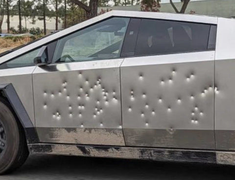 tesla bulletproof holes