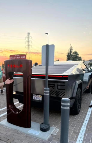 Tesla Cybertyruck charging at the 50000th Supercharger