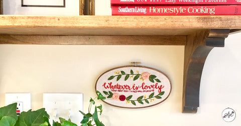 Oval embroidery hoop displayed in kitchen