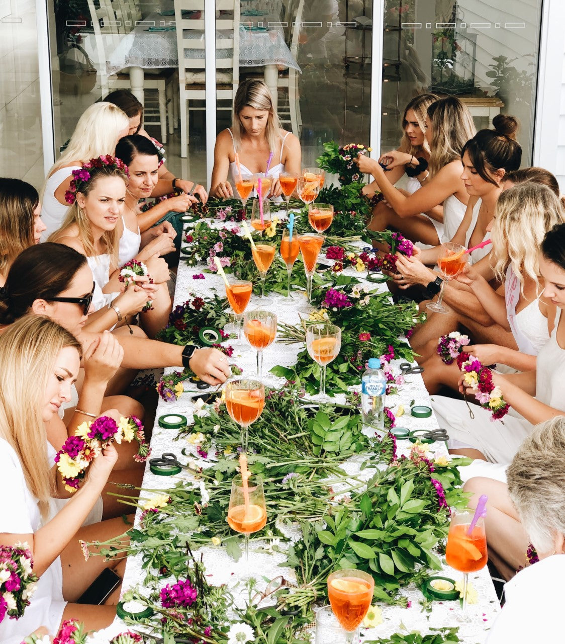 Hens party girls making flower crowns