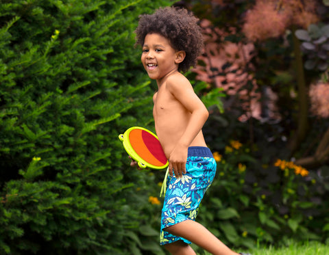 Boy playing outdoors