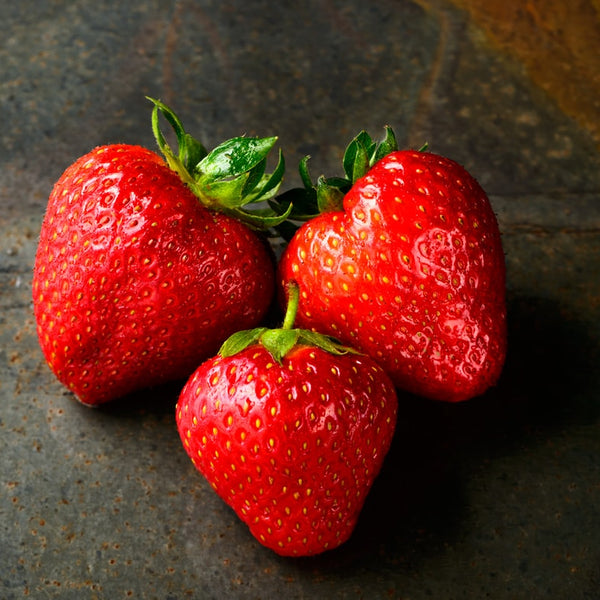Three ripe strawberries