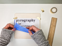Applying text to wood using blue transfer paper