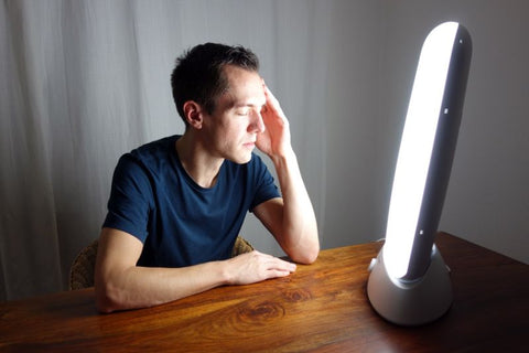 Man having Seasonal Affective Disorder Light Therapy