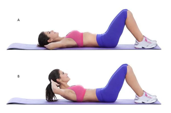 An image of a woman doing curl ups, one of the exercises for lower back pain.