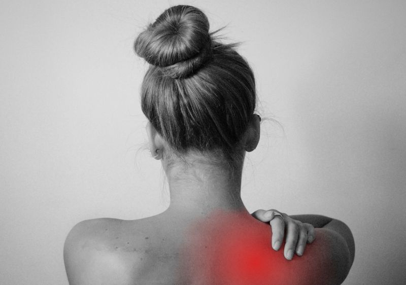 Woman with back pain fibromyalgia