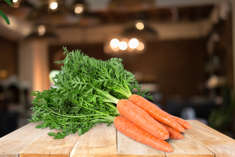 An image of carrots, one of the high fiber vegetables set on the table.