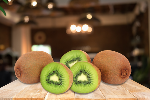 An image of a kiwi fruit, one of the high fiber foods available in our list, set on the table.