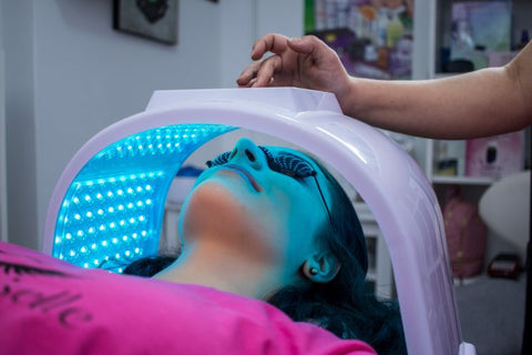 Girl having Blue light therapy