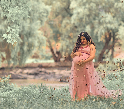 Blush pink maternity wedding guest dress