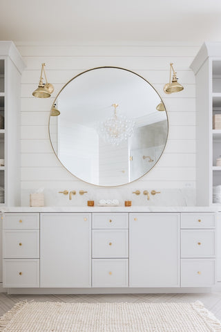 Bathroom vanity with sconces and bubble light fixture