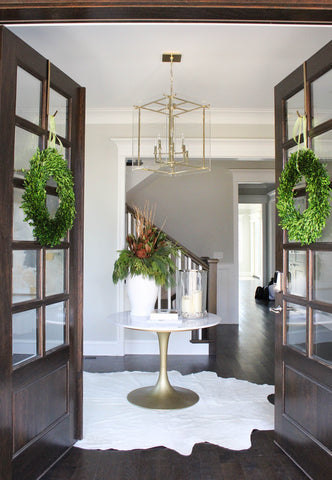 Entryway with dark stained double doors