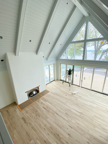 Great room with fireplace under construction