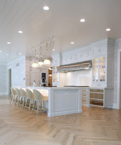 Kitchen island and range light fixtures and recessed cans