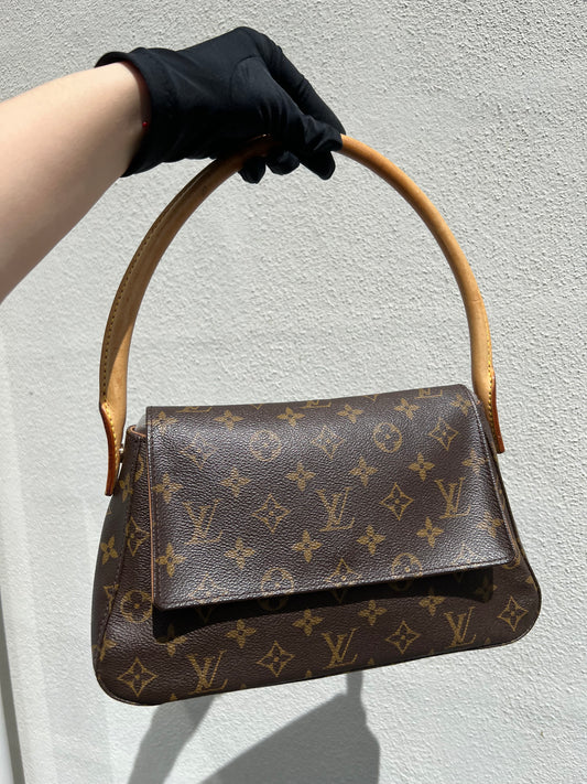 Pre-loved Louis Vuitton Vintage Damier Sauvage Vivian Handbag