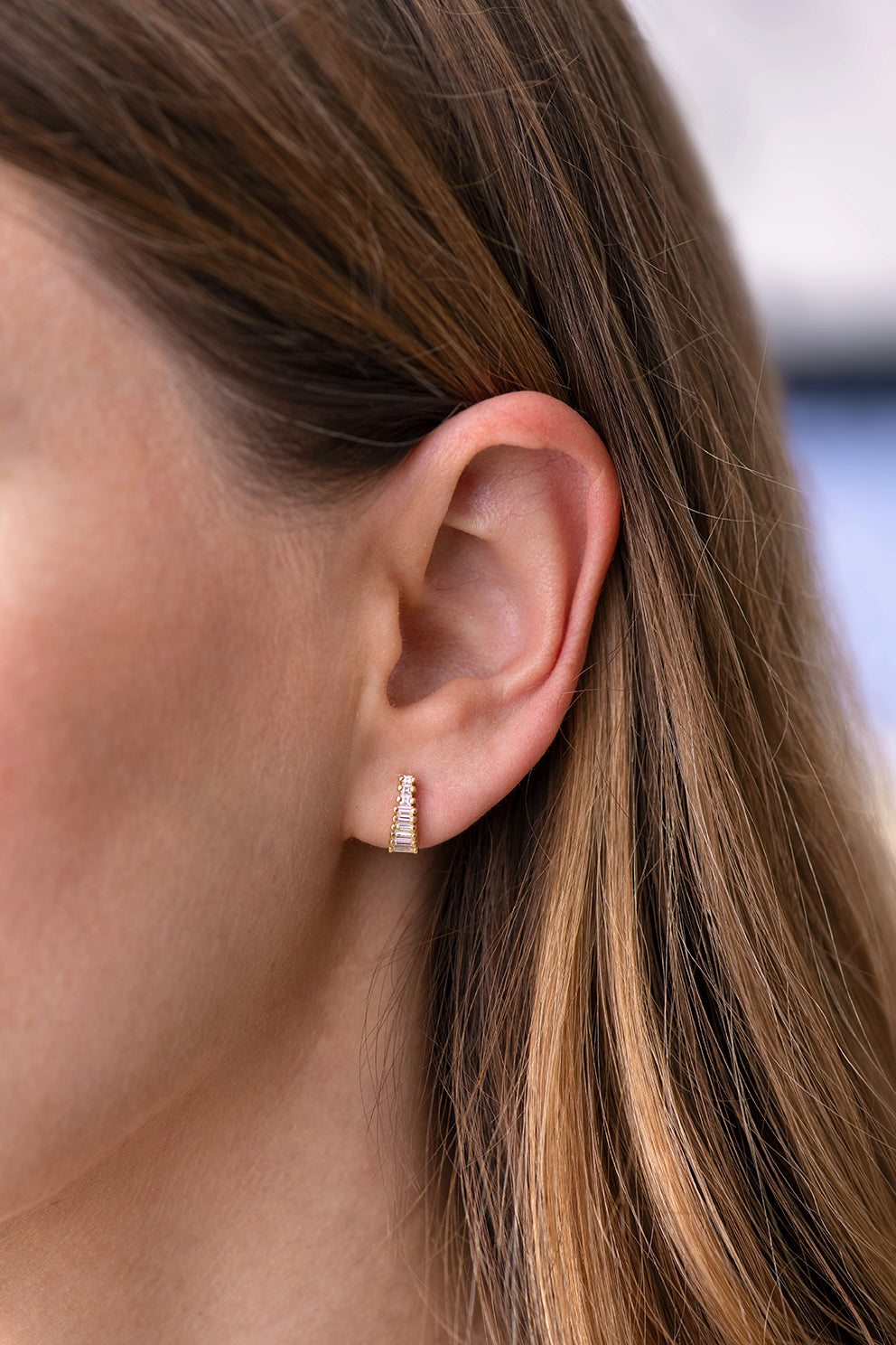 diamond earrings on ear