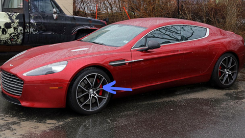 image of whole car with arrow pointing to caliper