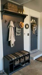 mudroom with cubbyholes and wall decorations