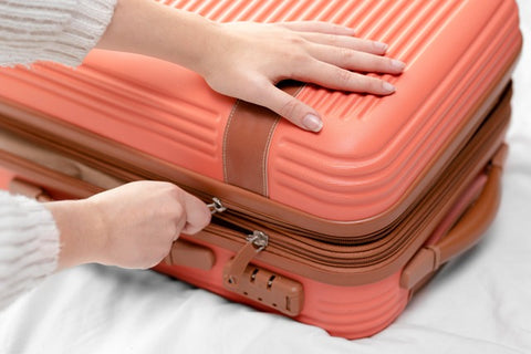 suitcase resetting the combination lock