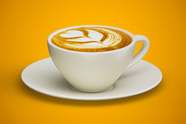 Decaf-Coffee-Benefits-for-Skin-and-Longevity-decaf-coffee-cup-yellow-gradient-background