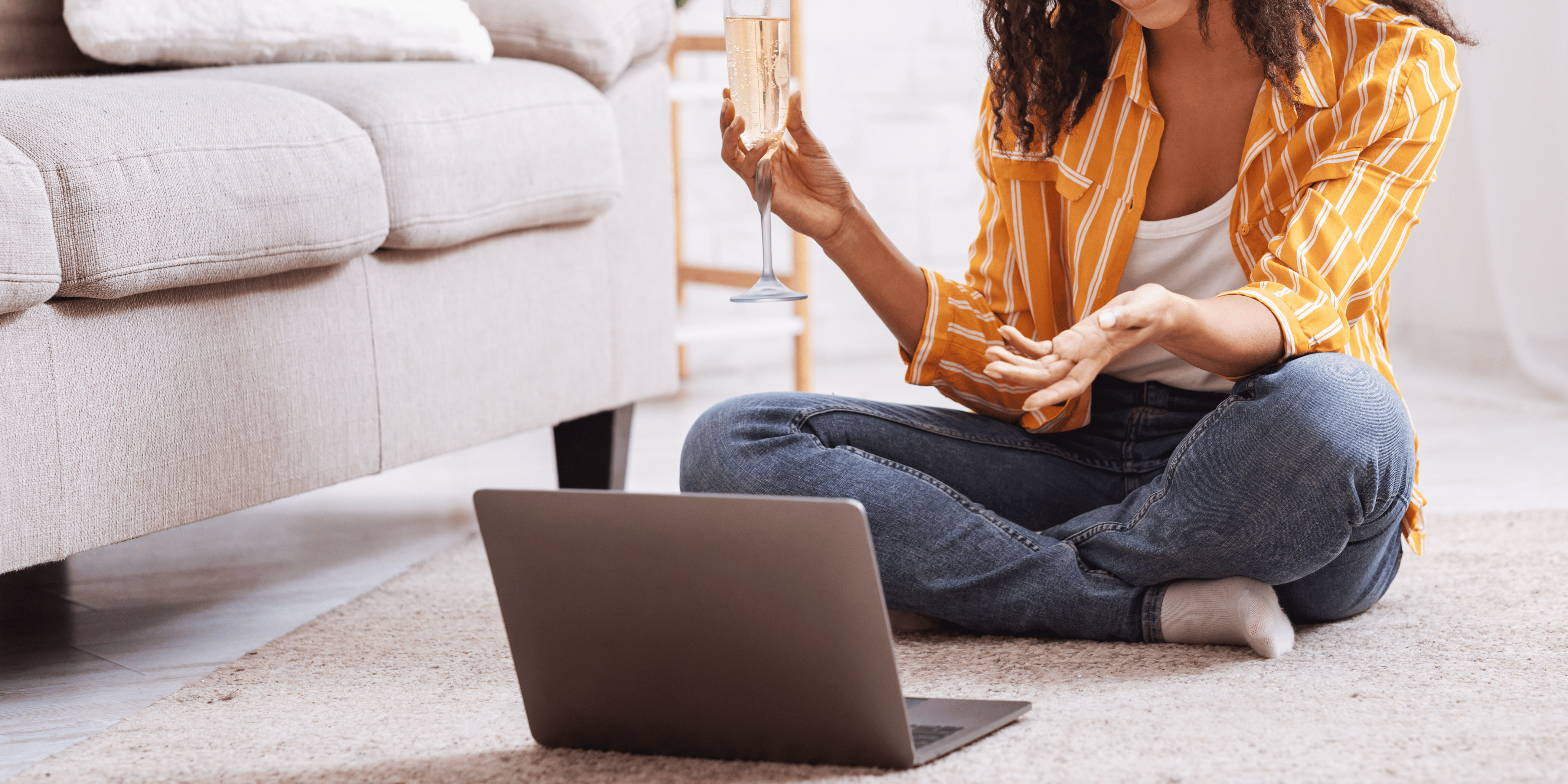 woman researching wine deals online